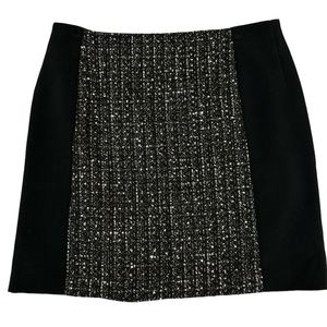 Loft short black skirt with tweed panel in front and back.  Size 10.